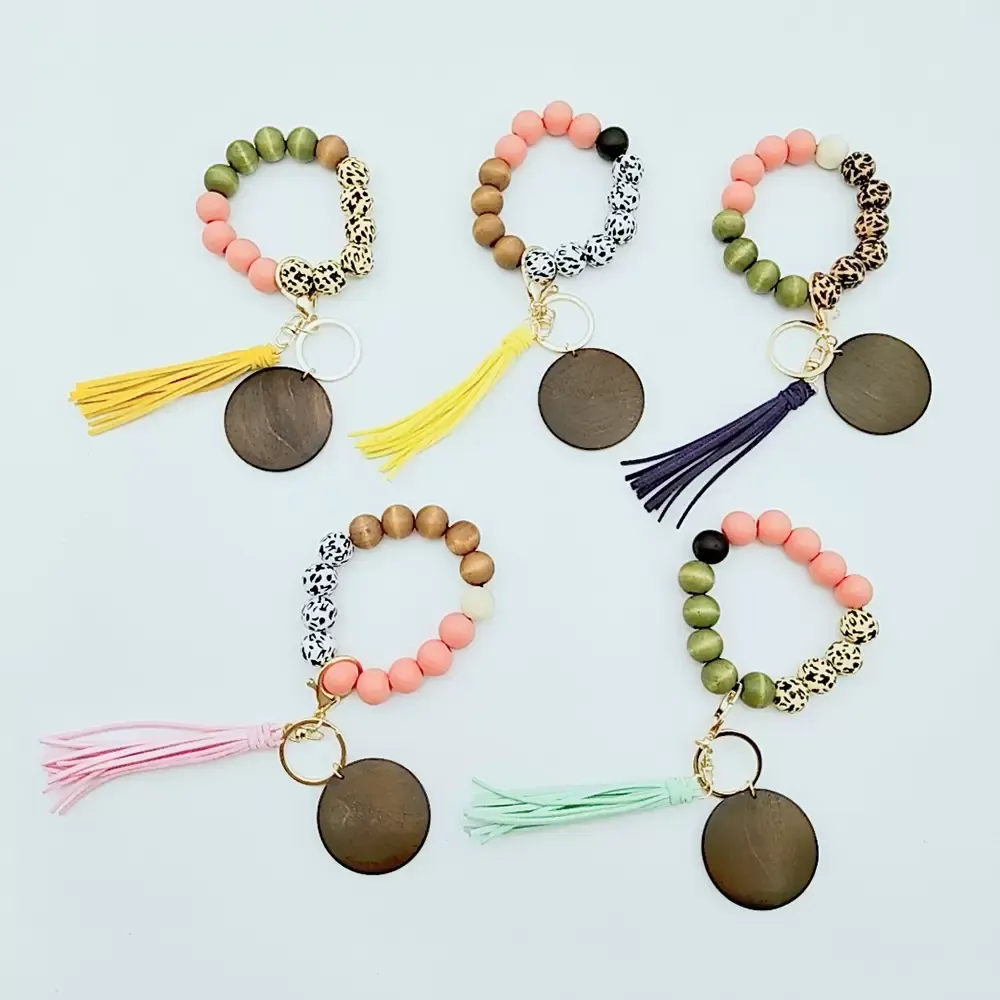 2022 Nya 10 stilar Träarmband Keychain Med Tassels Keys DIY Wood Fiber Pandent Woodwooden Bead Bangle Key Dekorera