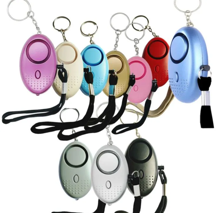 Party Favorit 130dB äggform Självförsvar Larm Keychain Hängsmycke Anpassa ficklampa Personlig Säkerhet Nyckelring Charm Bil Keyring Sn4382