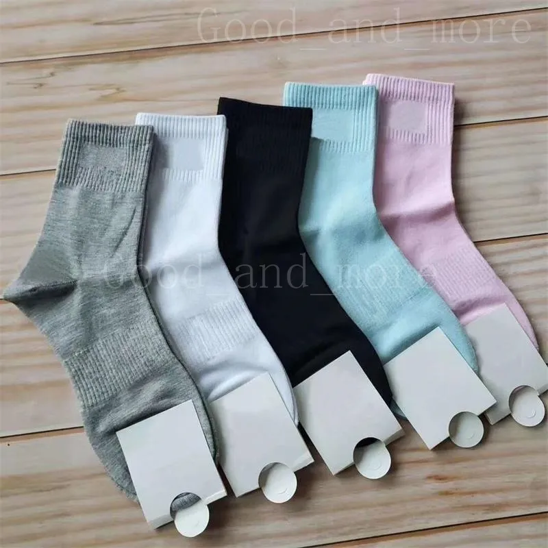 Garçon homme et fille femmes chaussettes lettre coton mi-longueur pure couleur sport sport décontracté confortable respirant mode