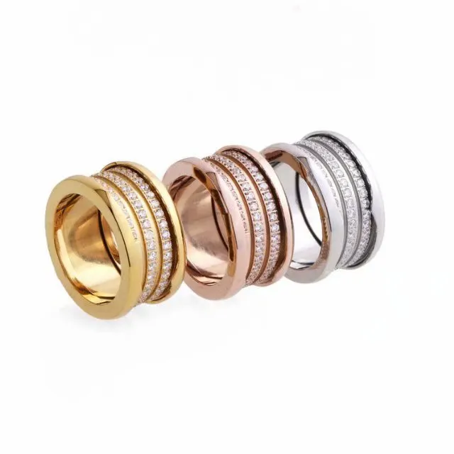 Europa América Estilo de moda Hombres Dama Mujer Titanio Acero Grabado B Iniciales Ajustes Tres círculos Diamante Tornillo Rosca Amantes Anillo Anillos