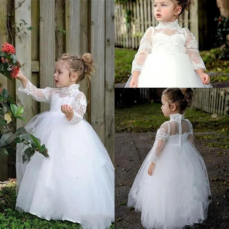 Puffy Princess Flower Girl Sukienki Białe Koronkowe Aplikacje Sheer Pełna Rękaw High Collar Suknia Balowa PIERWSZA Suknia Urodzinowa