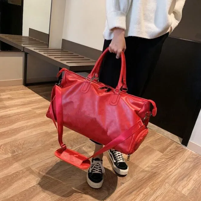 Designer-mode svart vatten krusning 45cm sport duffel väska röd bagage m53419 man och kvinnor duffel väskor med lås tagg
