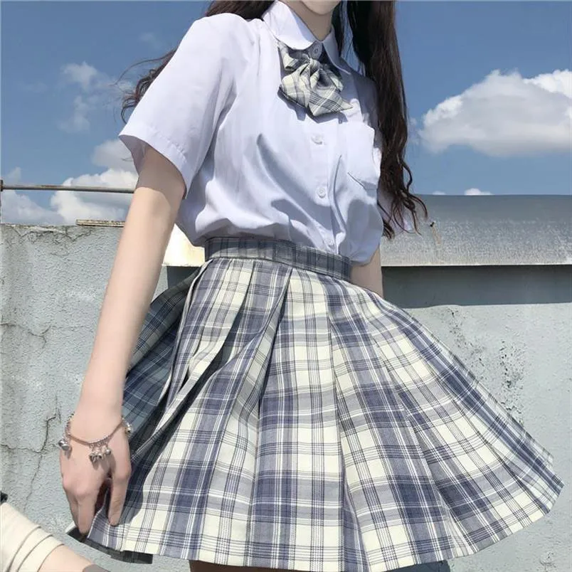 Pleated plaid mini skirt 90s discount