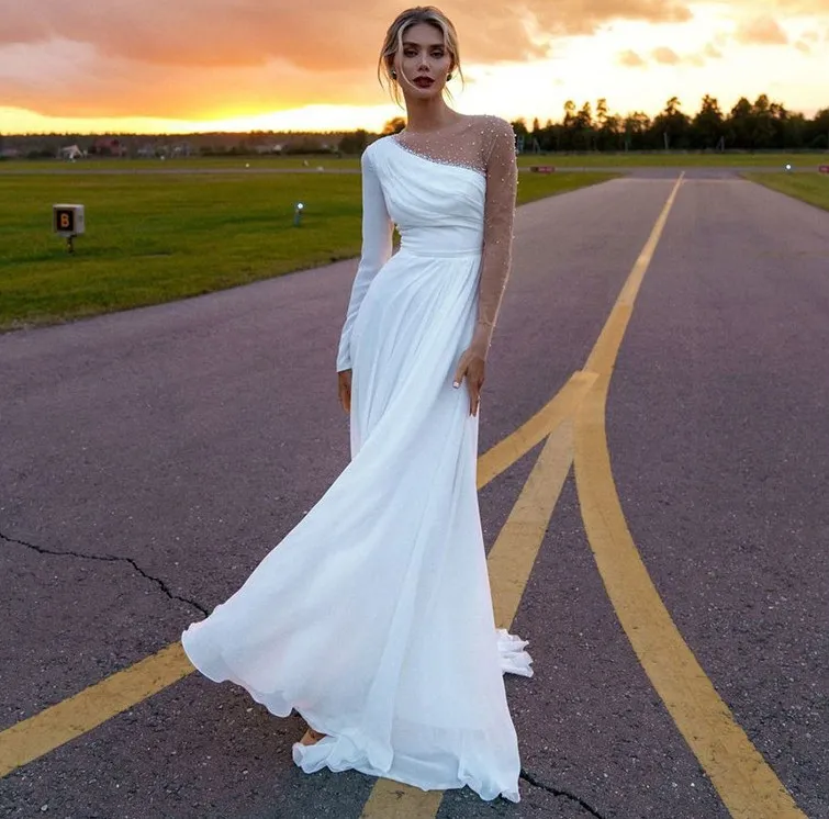 Boho Beach Wedding Dress 2021 - Illusion Pearls & Beaded Long Sleeves A-Line Long sleeve bridal Dress with Side Split - Vestidos Robe de Mariee Boho Beach Wedding Dress 2021 - Illusion Pearls & Beaded Long Sleeves A-Line Long sleeve bridal Dress with Side Split - Vestidos Robe de Mariee
