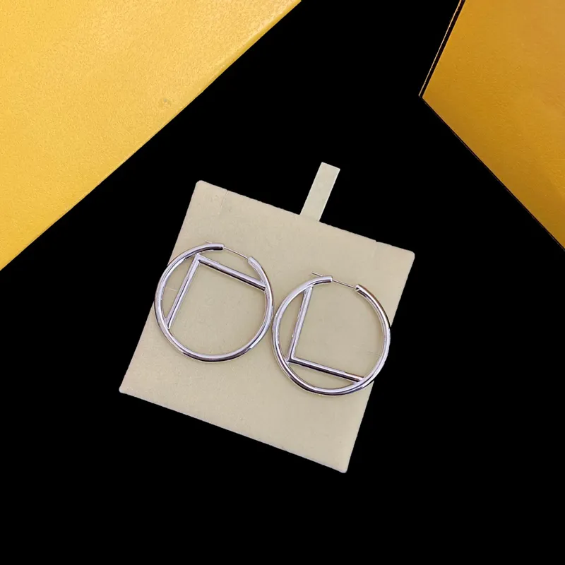 Designer silver hoops deals