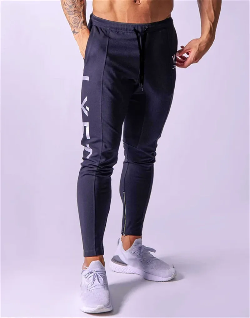 Projektant Whole-Marchwind Pantging Pants Mężczyźni sportowe spodnie dresowe Mężczyzny Joggers Bawełniane ścieżki Slim Fit Pants Bodybuilding 2846