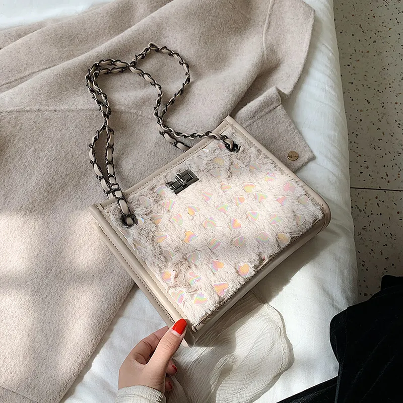 Hot Sale Elegant Kvinna Bucket Bag 2019 Vinter Mode Ny Högkvalitativ Plush Sequin Women's Handbag Lock Chain Shoulder Messenger Bag