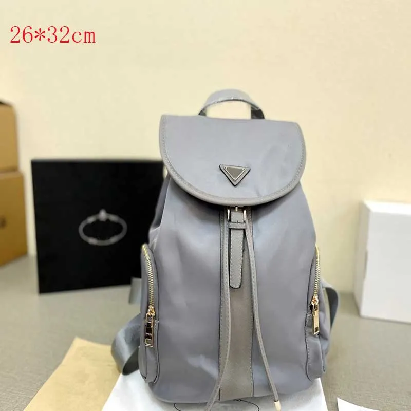 Mochila para homens e mulheres sacos de designer estilo esporte saco de alta qualidade ao ar livre pacotes carta impressão mochila de viagem saco de moda mochila