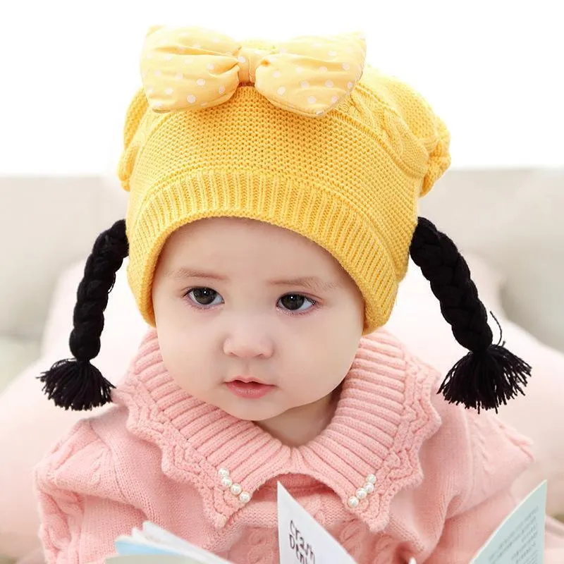 Симпатичные Baby Wig Hats Bow-yout Детские трикотажные косы шляпа на 3-18 месяцев Детские девочки младенческие шапки зима осенние головки