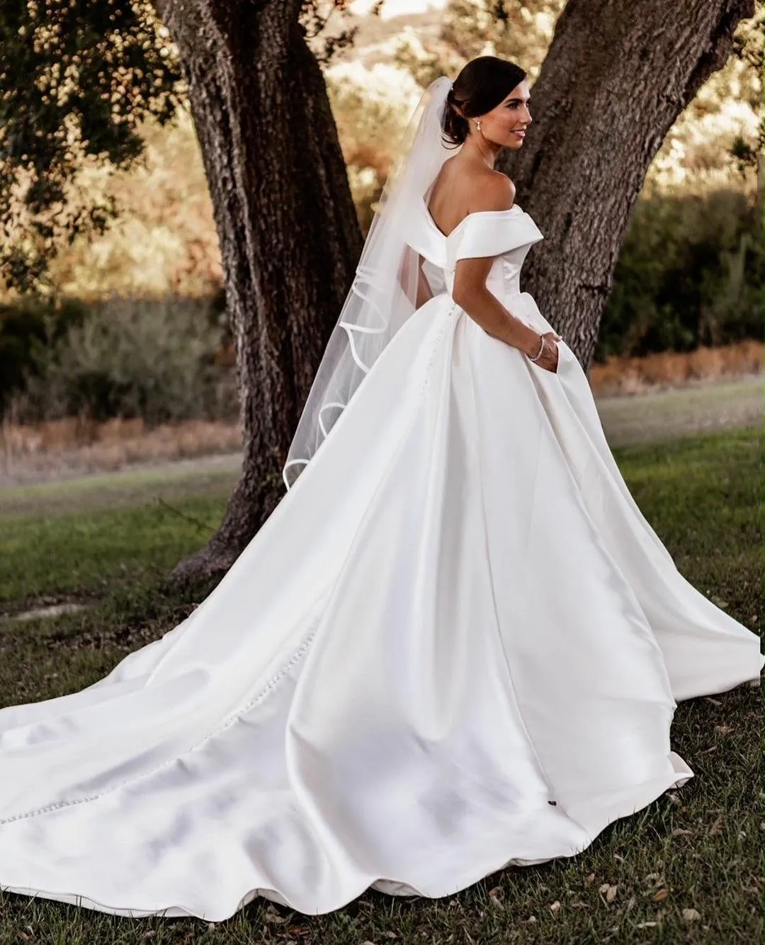 Satin wedding dress deals off shoulder