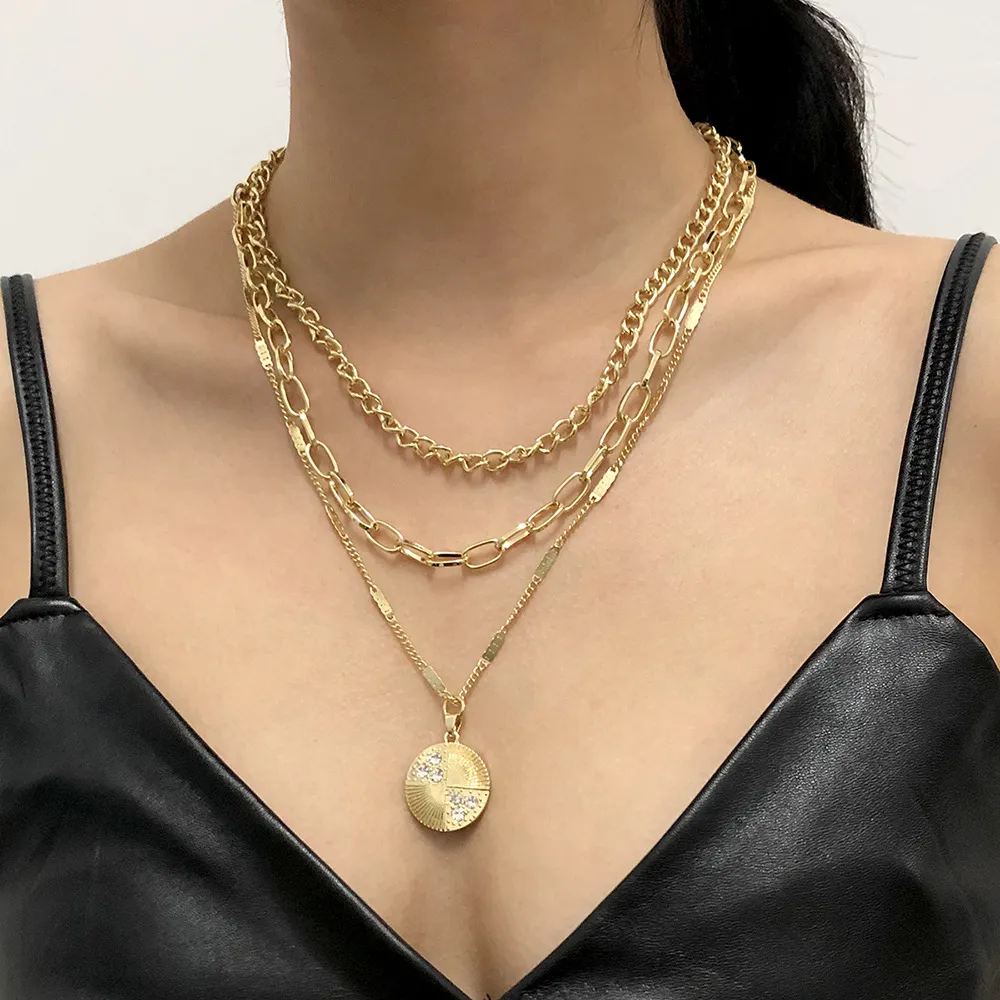 Nuova collana a catena a più strati della collana rotonda della clavicola della collana rotonda del pendente della lega del Rhinestone della Boemia di colore dell'oro della donna di arrivo