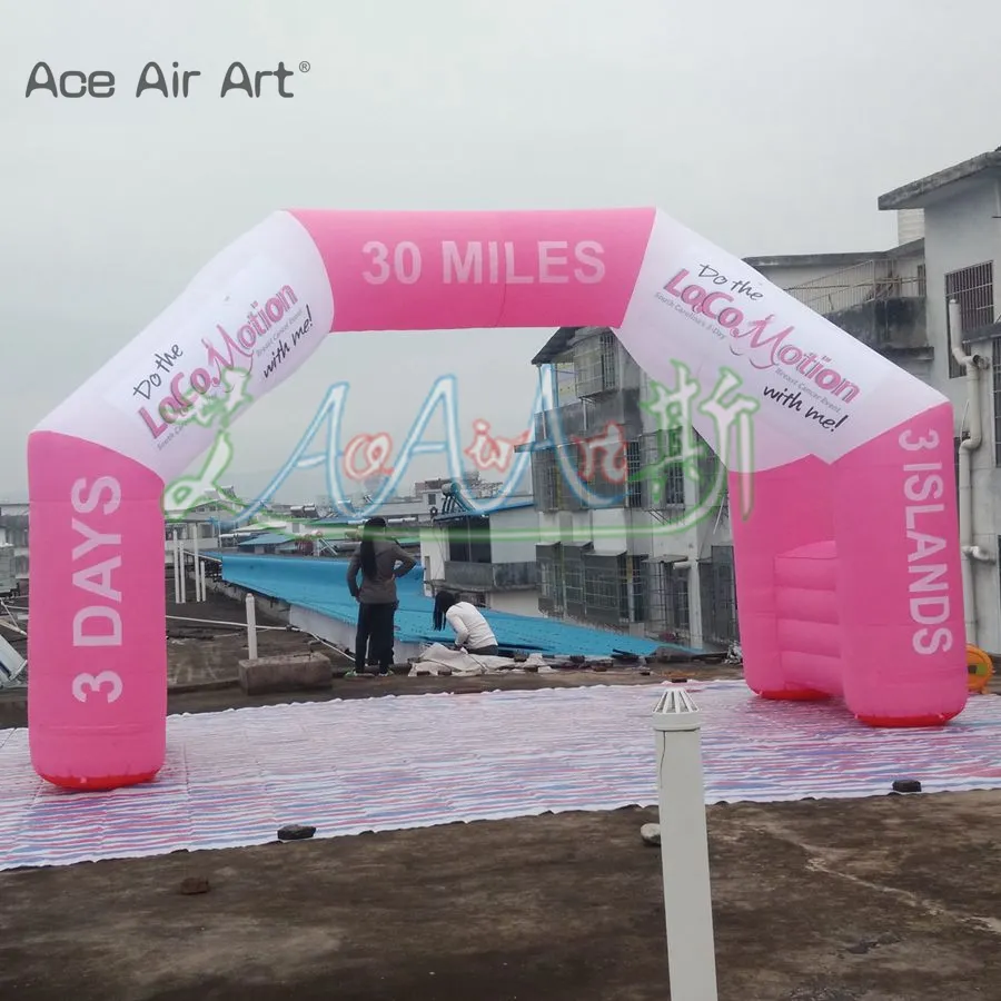 El arco publicitario inflable rosado intrépido viene con la aduana libre del PVC del ventilador tamaño para el evento