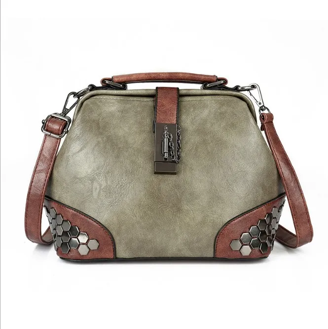 Mode kvinnor handväskor nya låsnitar vintage läder crossbody axel väska damer doktor väskor kvinnliga totes
