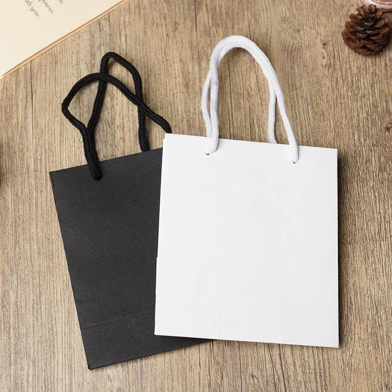 Bolsas de Papel Kraft, Blanco y simple, pequeño y grande - Bolsas de papel  Kraft al por mayor con asas Tipos