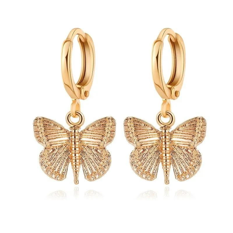 Hot Europe Retro Butterfly Stud Pendientes Personalidad Aleación Insecto Oreja Colgante Mujer Mujer Vestir Oreja Cuelga Joyería