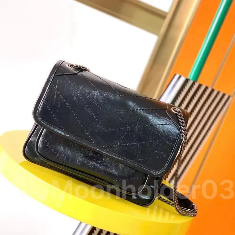 Niki leather messenger bag
