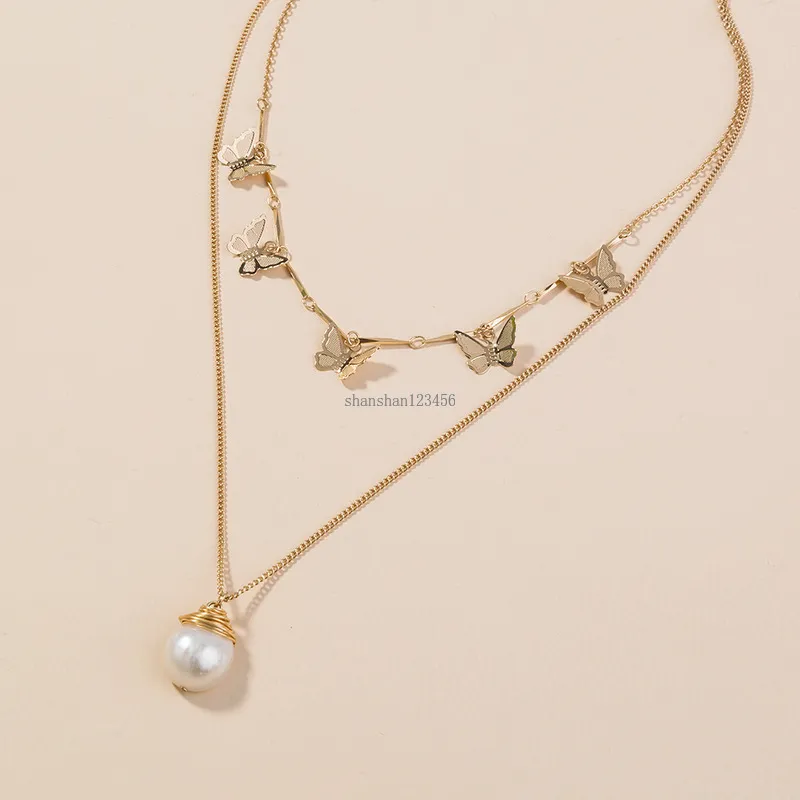 Collier ras du cou en perles et papillon, chaînes en or multicouches pour femmes, bijoux à la mode, cadeau et sable