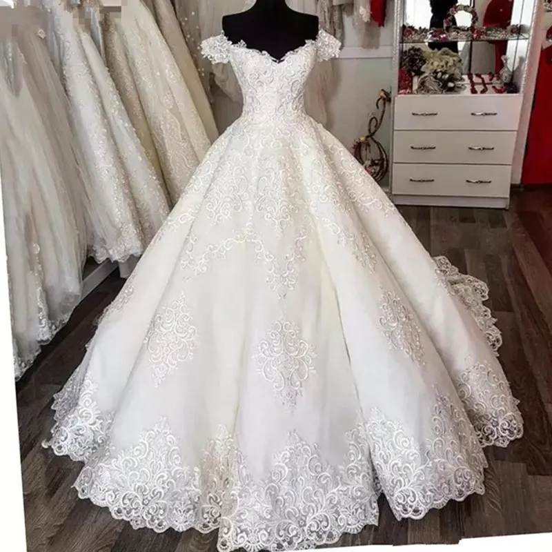 Long Sleeve Wedding Dress With Rhinestones Crystals Backless Ball Gown Spring Quinceanera Dresses