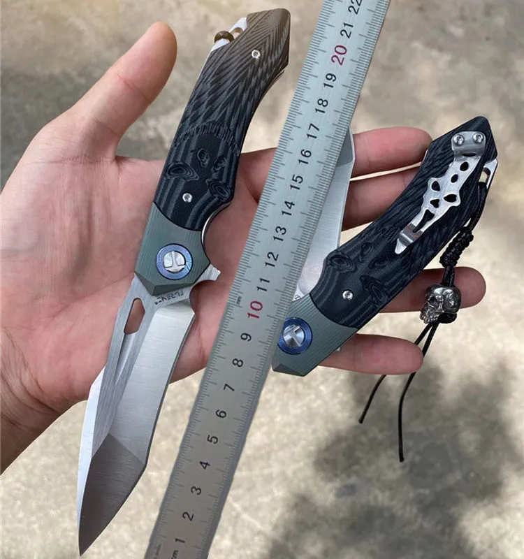 1 Styck Nytt kullager fällkniv D2 Satin Tanto Point Blade TC4 Titanium Alloy + G10 Handtag EDC Fickknivar