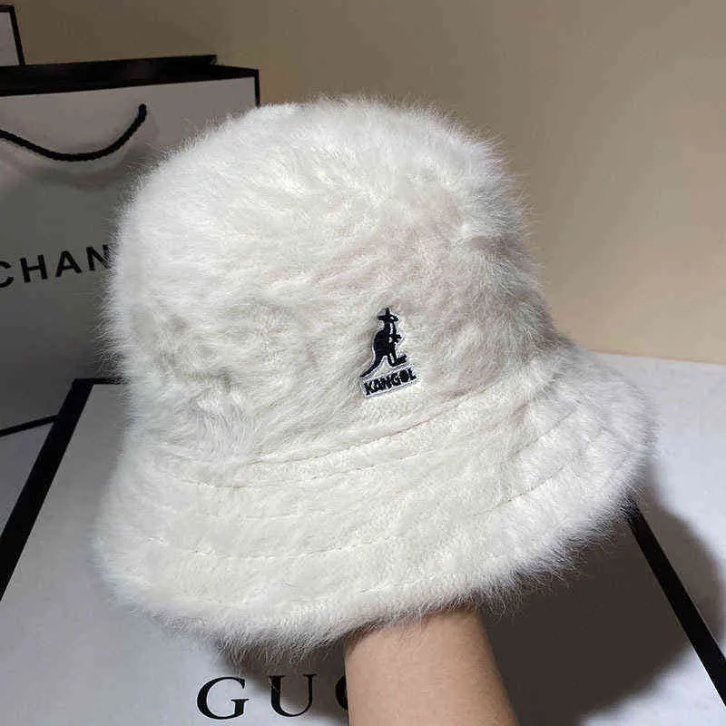 White fuzzy kangol best sale hat