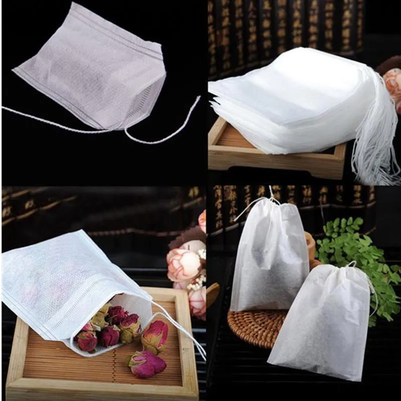 100pcs / pack sachets de thé 5,5 x 7cm sachets de thé parfumés vides avec du papier filtre de joint de guérison de ficelle pour le thé en vrac aux herbes EEA2189