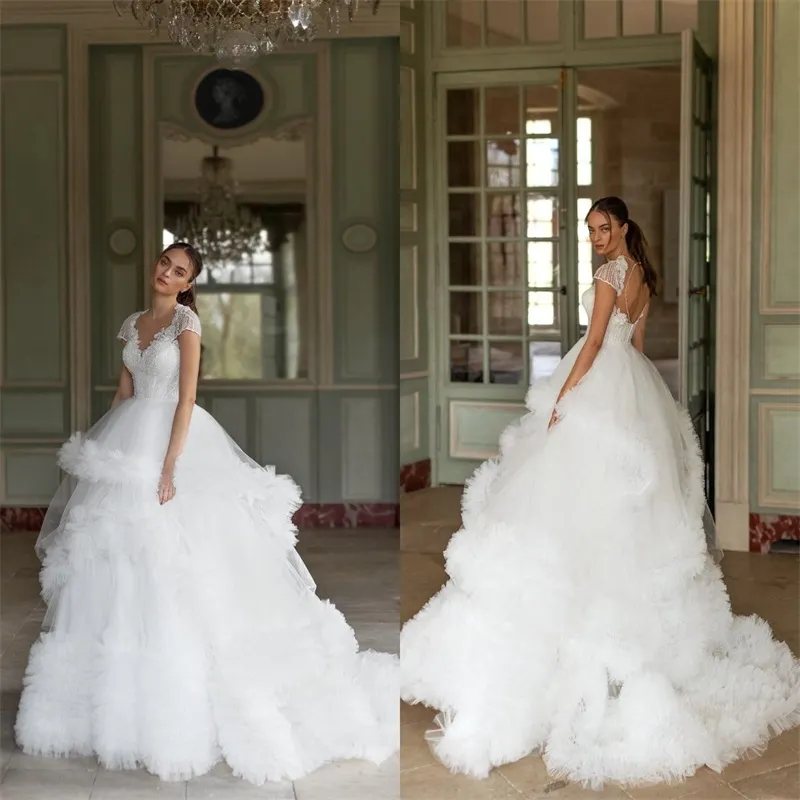 Superbes robes de mariée A-ligne volants plage Boho manches courtes perles dentelle Applique robes de mariée à plusieurs niveaux Tulle sur mesure Vestidos De Novia