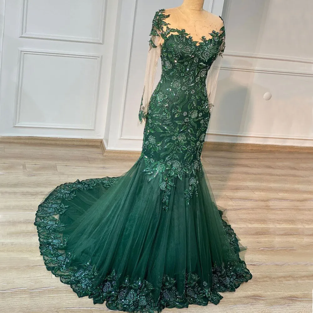 Graceful Hunter Abiti da ballo con perline a sirena Sheer Jewel Neck Maniche lunghe Appliqued Abiti da sera Tulle Sweep Train Abito formale con paillettes