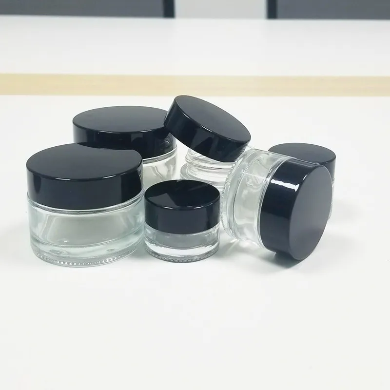 Avancerad 5 ml 10 ml 15 ml 20 ml 30 ml 50 ml 60 ml 100 ml transparent glas ansikte grädde kroppskräm burk med svart lock lufttätt lukt bevis klart glas kosmetiska burk gratis fartyg