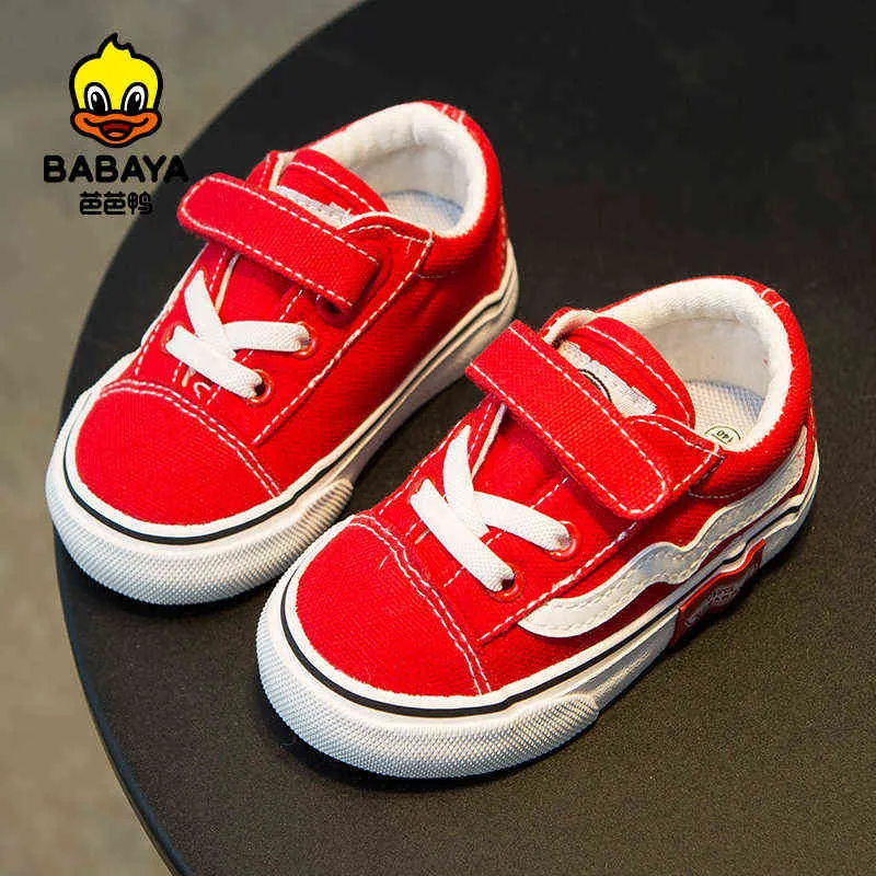 Premium Photo | Baby red sneakers isolated on white background.