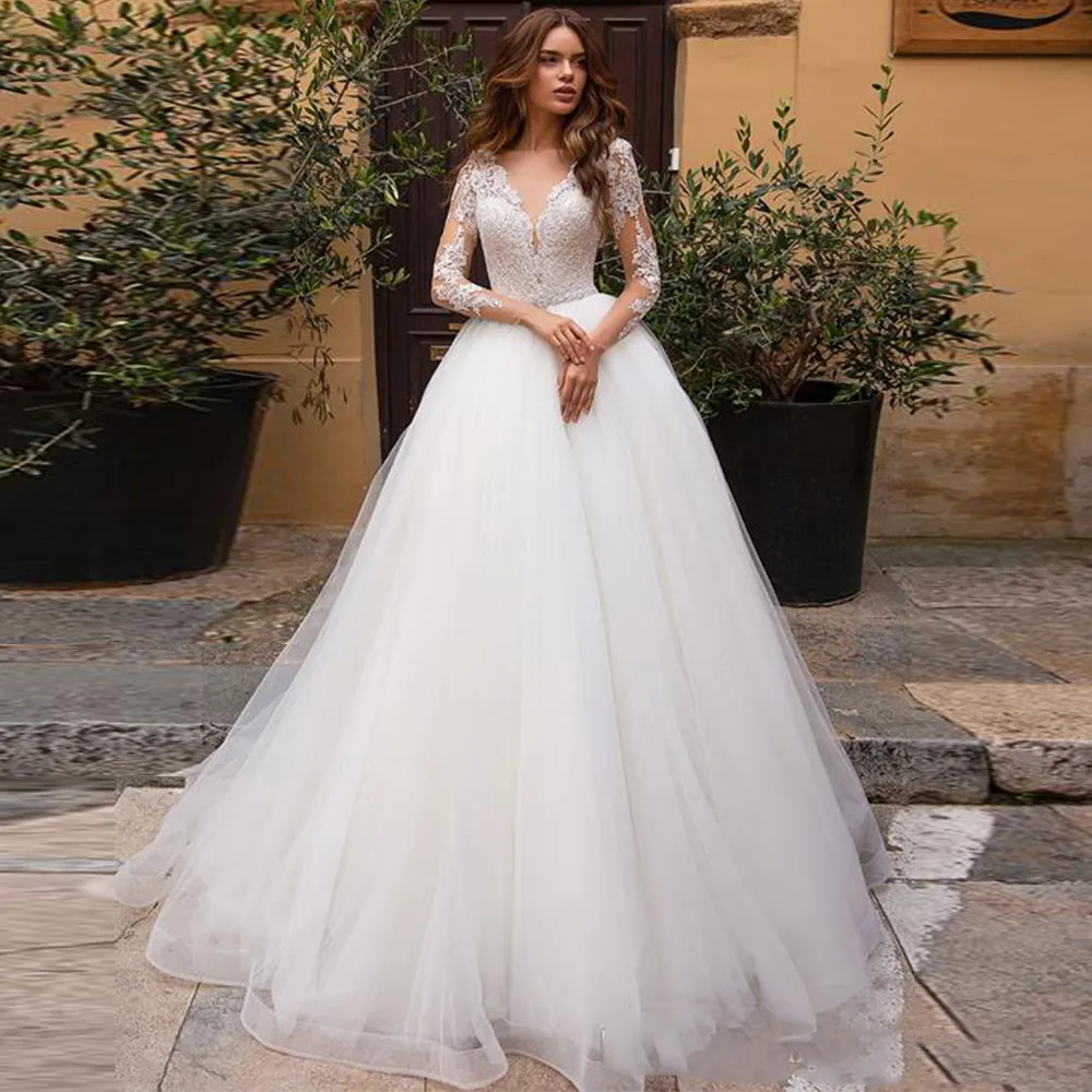 Elegant A-Line Bröllopsklänning V-Neck Långärmad Tulle Bridal Klänningar Illusion Tillbaka Med Applikationer Ny Klänning