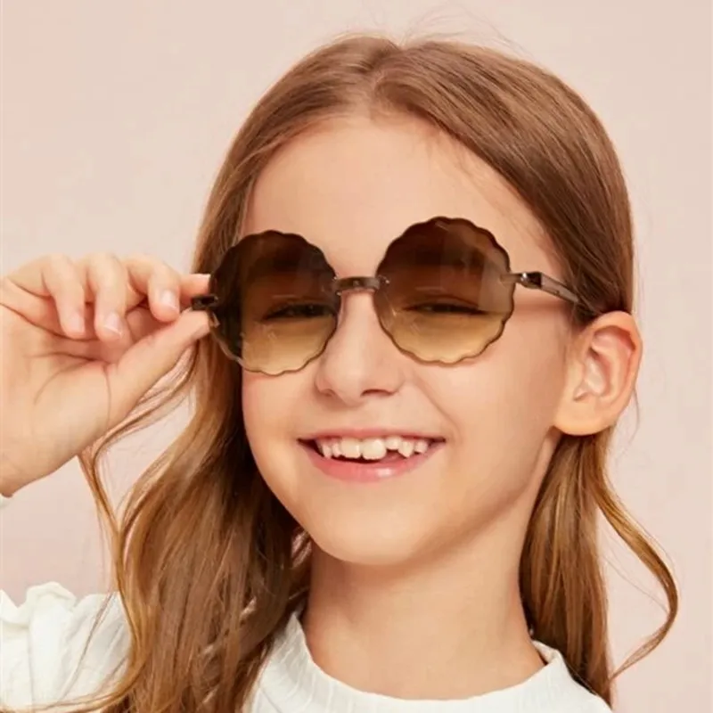 Lunettes de soleil sans bords pour enfants, à la mode, monture ronde à fleurs, pour filles, lunettes d'extérieur, Style mignon, lunettes de fête