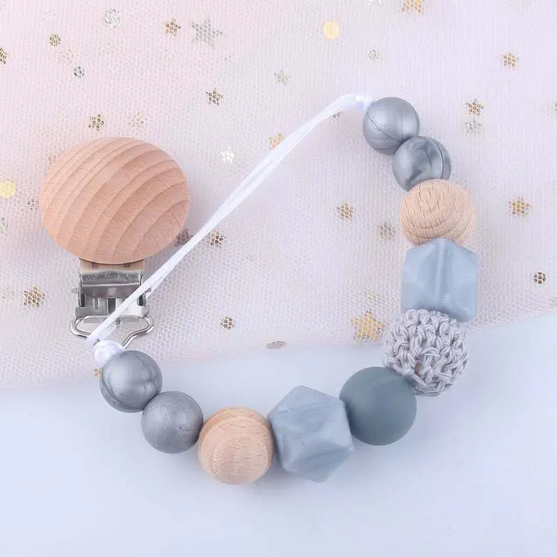 Venta directa de fábrica, pulsera de chupete de silicona para bebé, juguete molar, productos maternos e infantiles anticaída