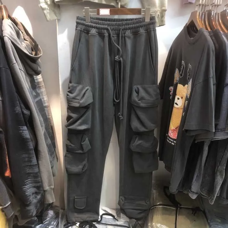 Marchio di marea autunnale e invernale lontano Pantaloni da lavoro da uomo funzionali da vento High Street Pantaloni larghi casuali multi tasche in peluche