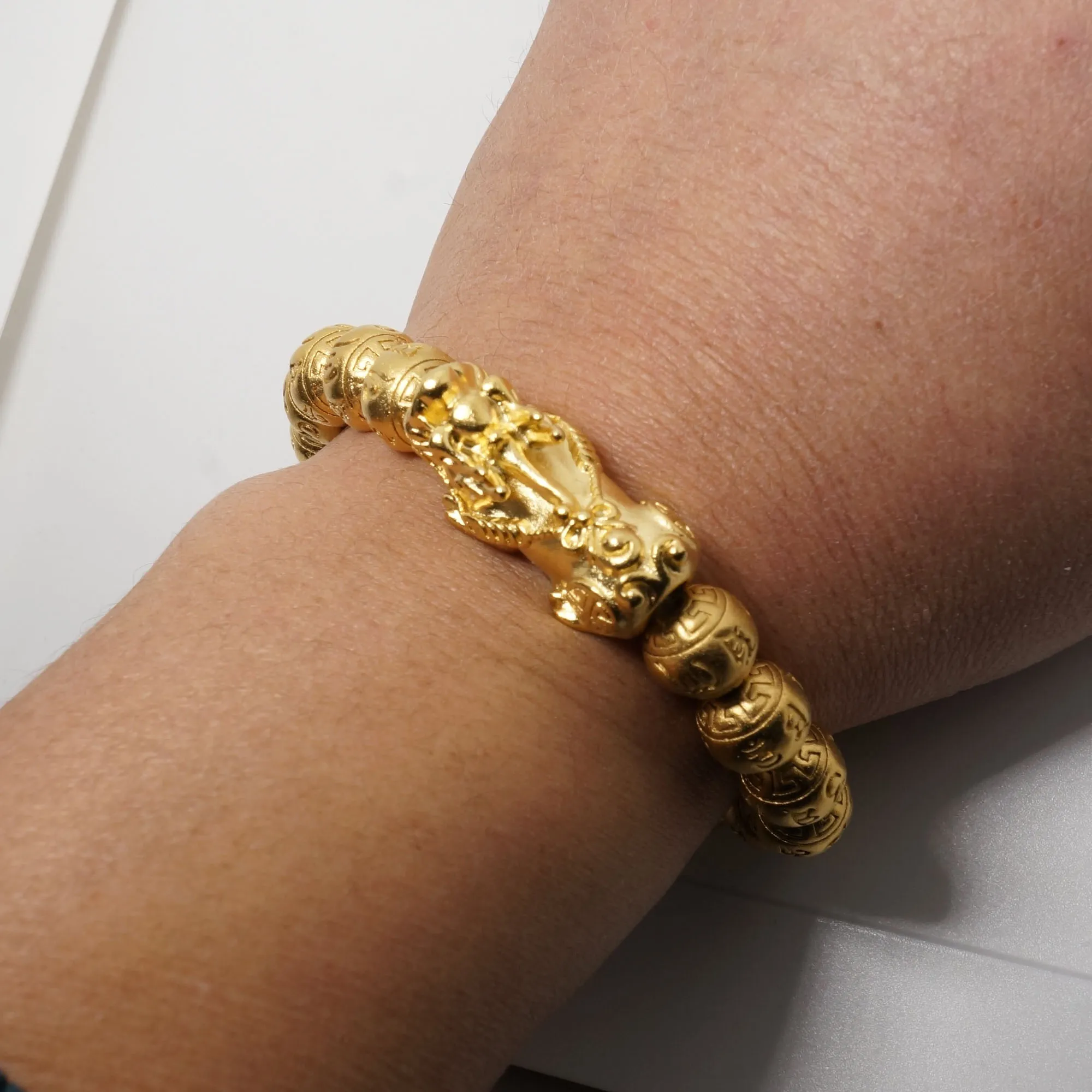 Swarovski Swarovski Symbolic Buddha Bracelet, Light multi-colored, Gold-tone  plated 5514410 - Morré Lyons Jewelers