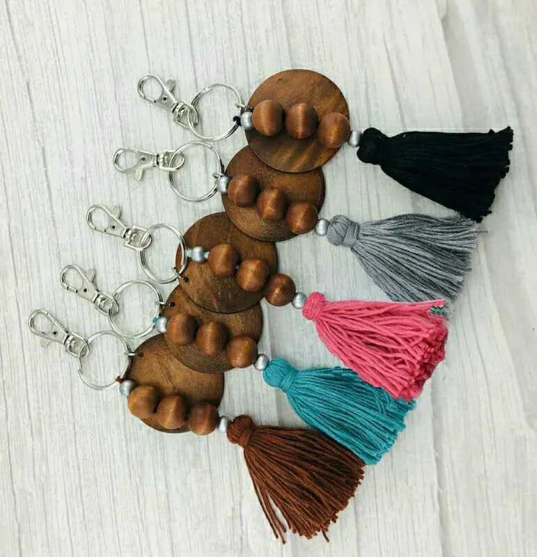 Cross-border fashion personality beaded wooden bead keychain round wood printable disc tassel key pendant