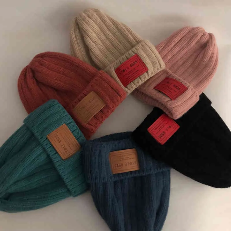 Chapeau d'hiver décontracté en laine solide, casquettes Hip-hop chaudes de printemps, chapeau tricoté Skullies, bonnets pour hommes et femmes