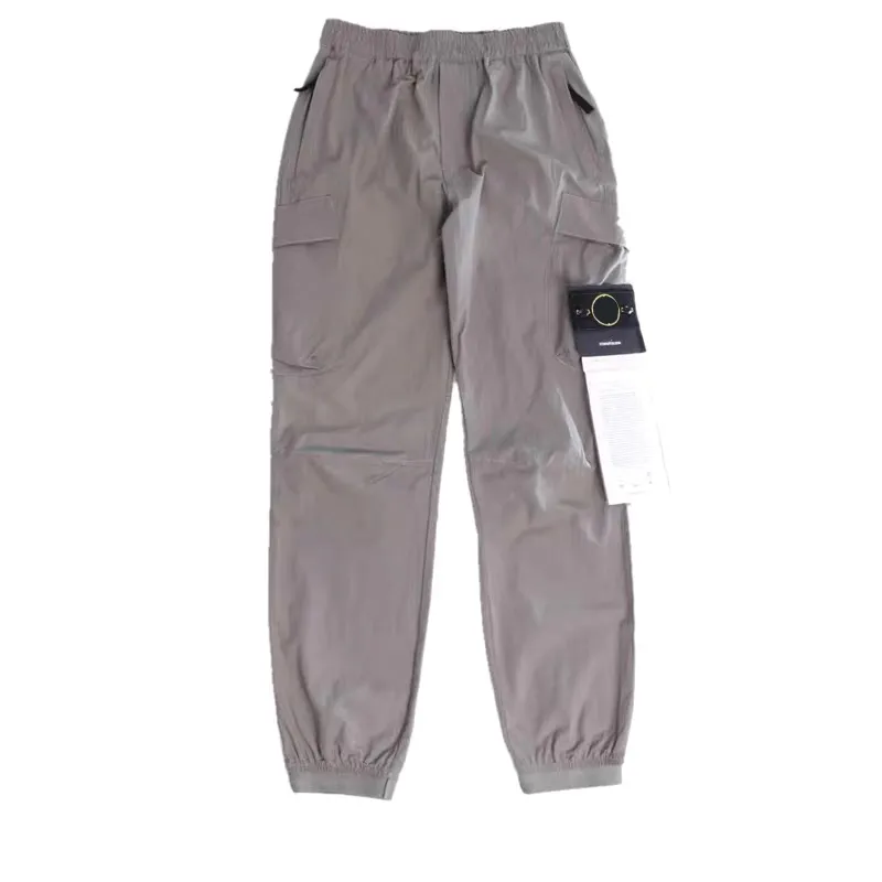 21SS Spring Men Cotton Pants 기본 나침반 배지 자수 고품질 도구 포켓 바지 스포츠 착용 캐주얼 바지 27071717212