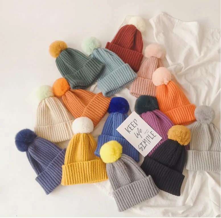 Baby warme effen kleuren hoeden konijn haar pompom bal caps kinderen kinderen oor beschermer imitatie wind gebreide hoed jongens meisjes wol mutsen