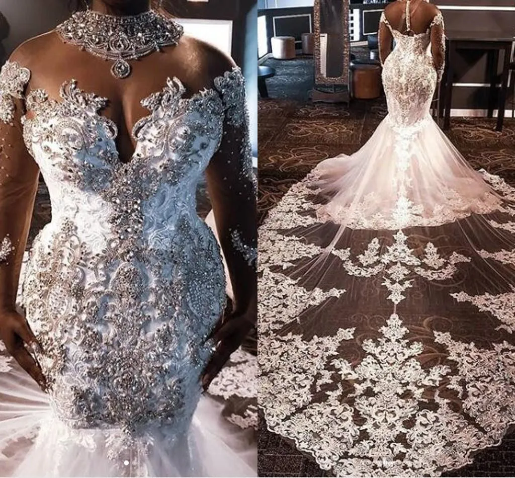 Abiti da sposa a sirena di lusso scintillanti Plus Size Illusion Manica lunga Collo alto Abiti da sposa con strascico africano in rilievo di pizzo di cristallo