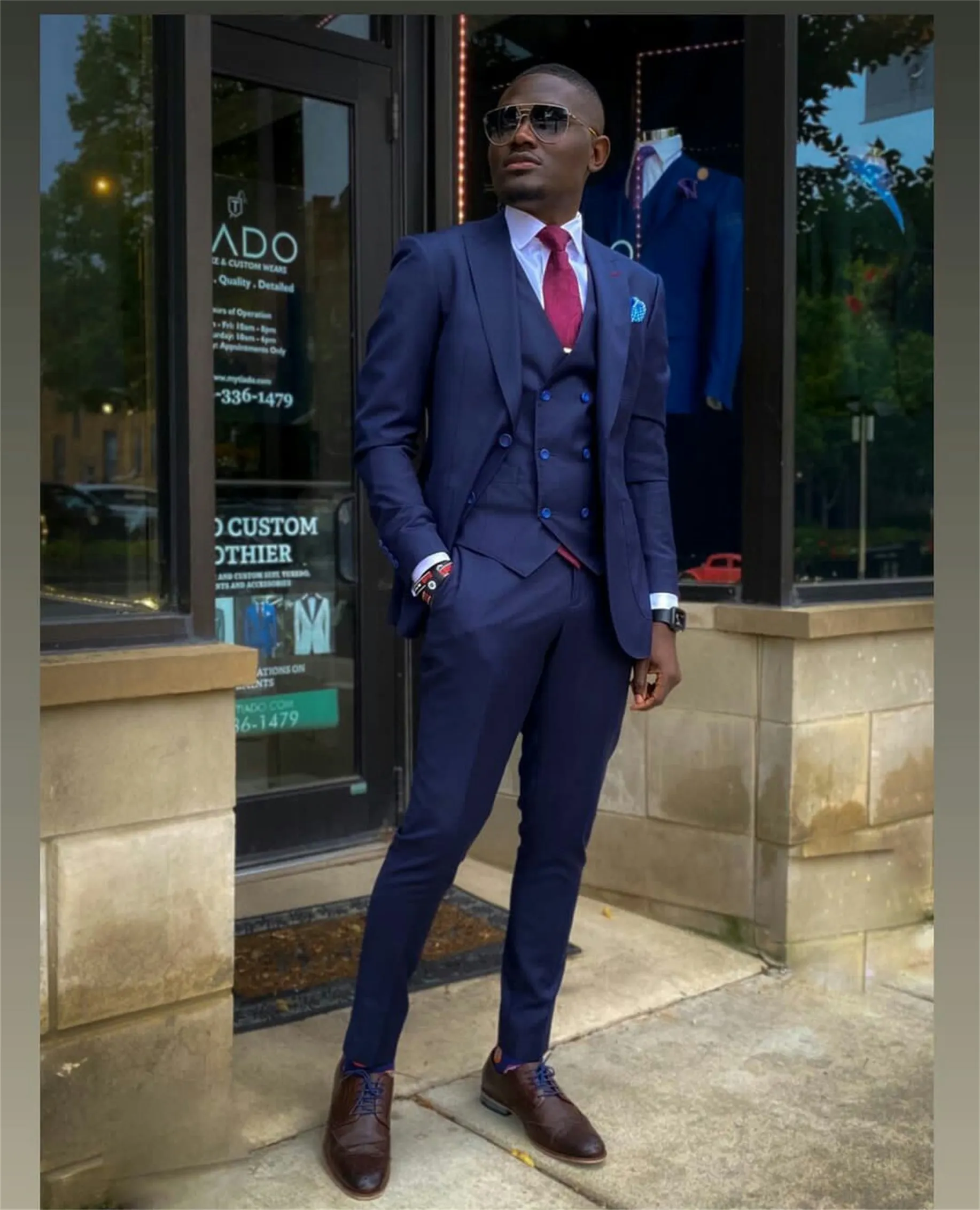 Blue pant coat with store red tie