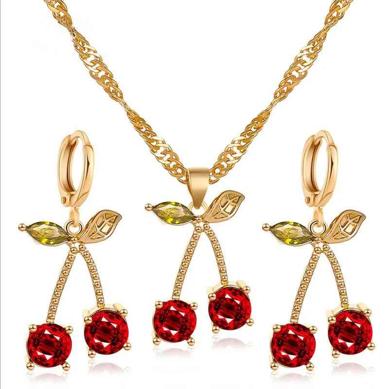 Set di gioielli per la festa nuziale calda in Europa Set di orecchini per collana di ciliegie rosse di melograno per le donne Accessori di moda in erba di cristallo