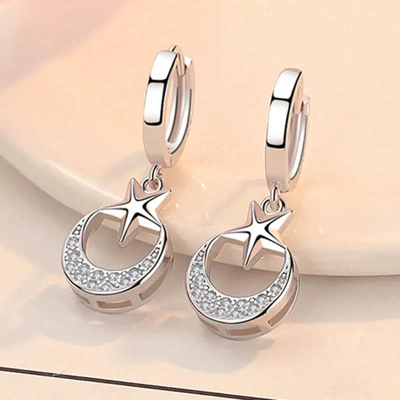 Version coréenne de bijoux d'oreille simple incrusté de zircon blanc cuivre boucles d'oreilles plaquées argent personnalité étoile lune boucle d'oreille clous d'oreille en gros