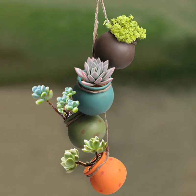 Ensemble de quatre pièces de pot de fleurs suspendu en céramique balcon perméable à l'air pot de plante mural suspendu jardinière en céramique pastel rustique Y200709