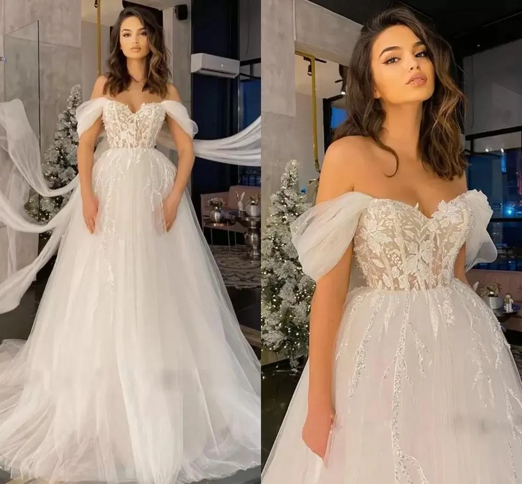 Trouwjurken romantische kant applicaties uit de schouder Sexy Empire Taille Sweep Train Bridal Jurken Arabisch Aso Ebi Boho Garden Vestidos de Novia