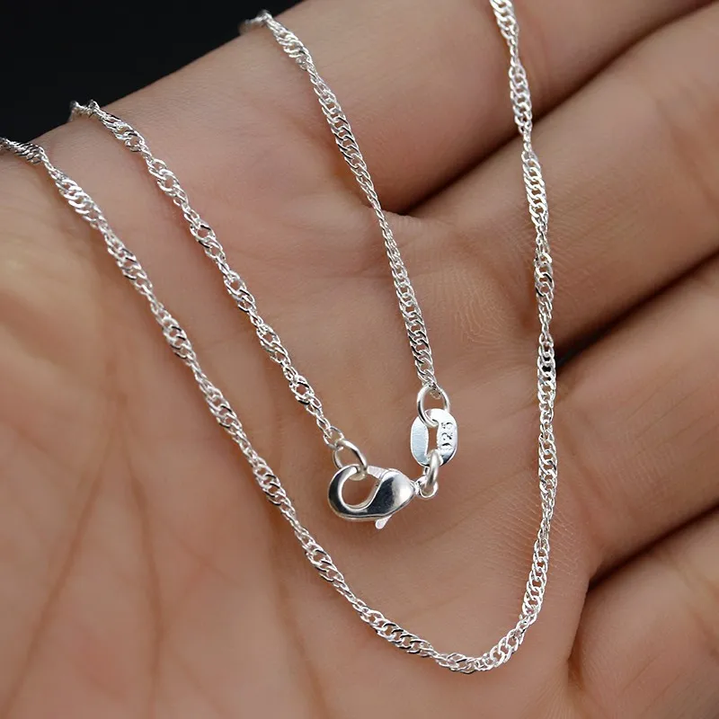 Collier de chaîne de vague torsadée en cuivre plaqué argent pour femmes à la main à la mode à vendre