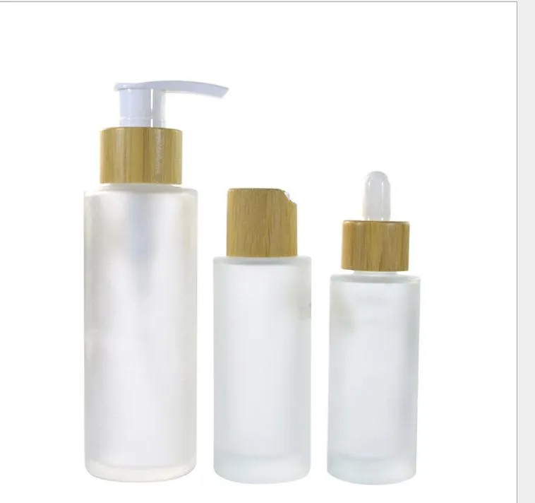 70pcs * 100ml frost glasflaska med bambu lotion pump emulsion pumpflaskor tom kosmetisk förpackning glas dimma spray
