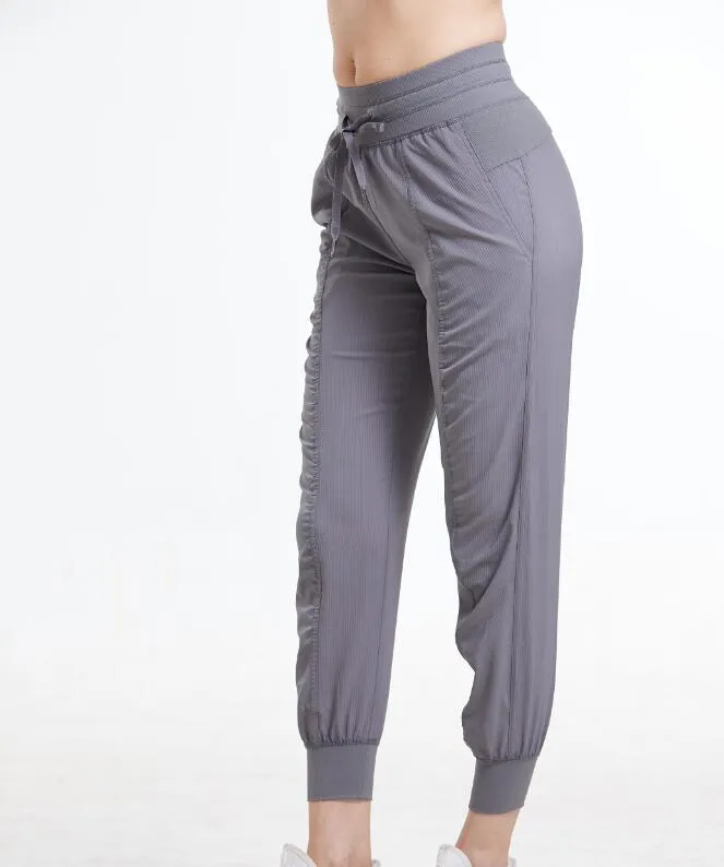 Kvinnors joggare byxor Aktiva Sweatpants Workout Yoga Lounge Spårbyxor med fickor Leggings 1074