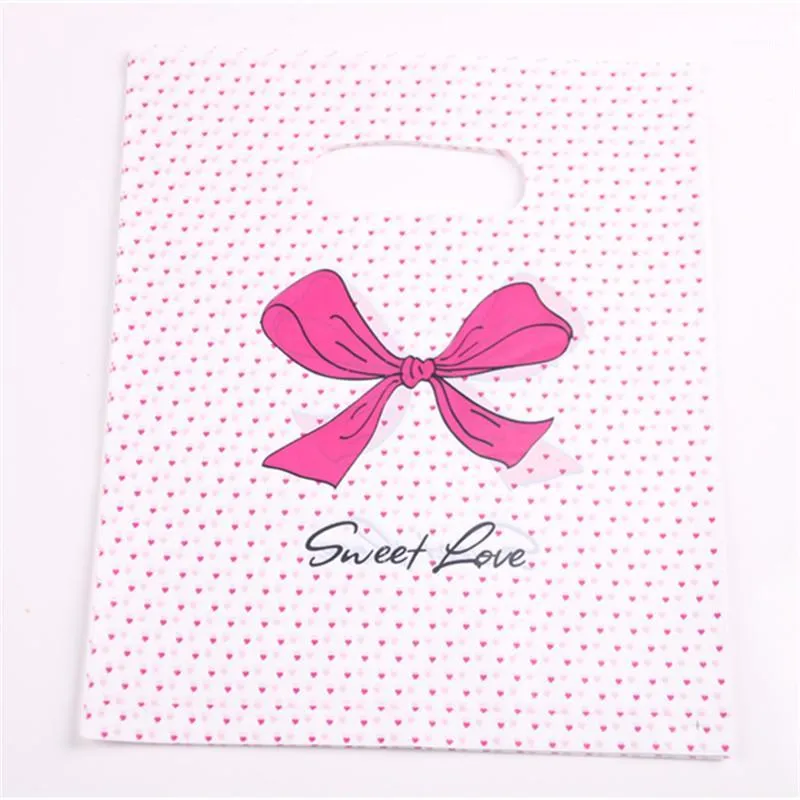 Gift Wrap Design Wholesale 100pcs/lot 20*25cm Pink Sweet Love Packaging Bags For T-shirt Plastic Shopping With Dot Bow1