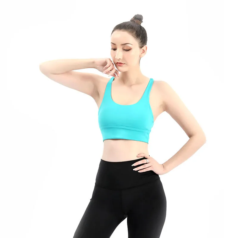 Sexy Cross -riemen yoga gym sport beha dames draadloze yoga fitness top gevoerde push -up crop top activewear