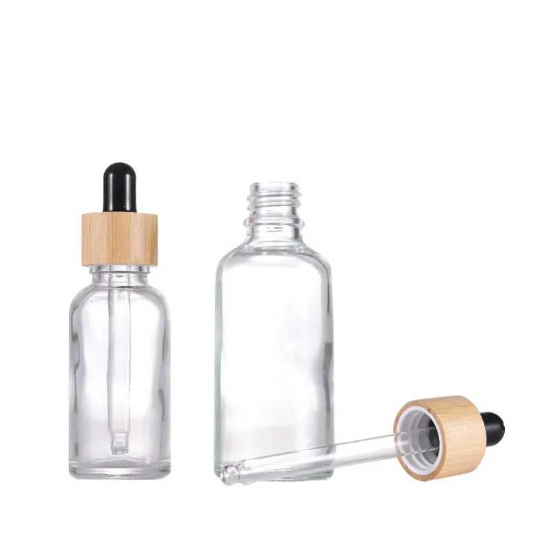 Klarglas-Tropfflasche für ätherische Öle mit Bambusdeckeln, transparente Kosmetikverpackung, Pipettenflasche, Massenware